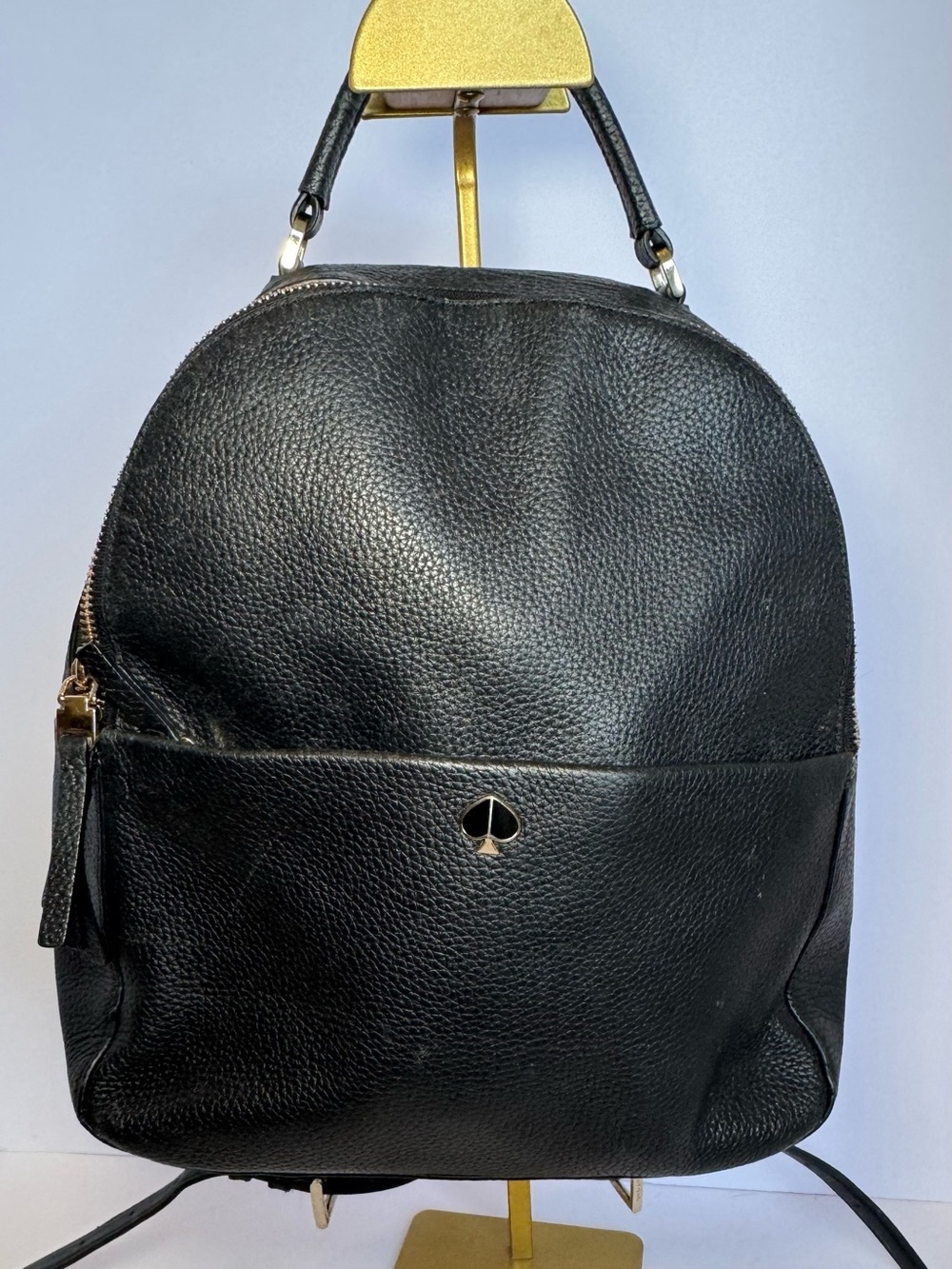 Kate Spade medium backpack in black pebbled leather with gold-tone hardware